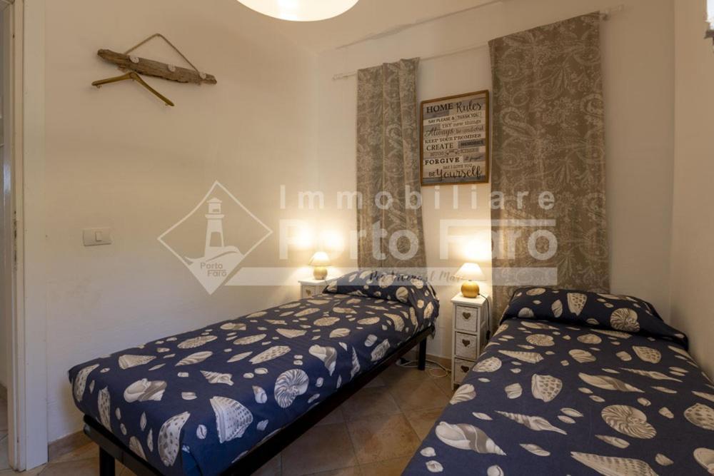 2 Pineta - Ampio Quadrilocale Sulla Spiaggia Di Porto Faro Palau Buitenkant foto